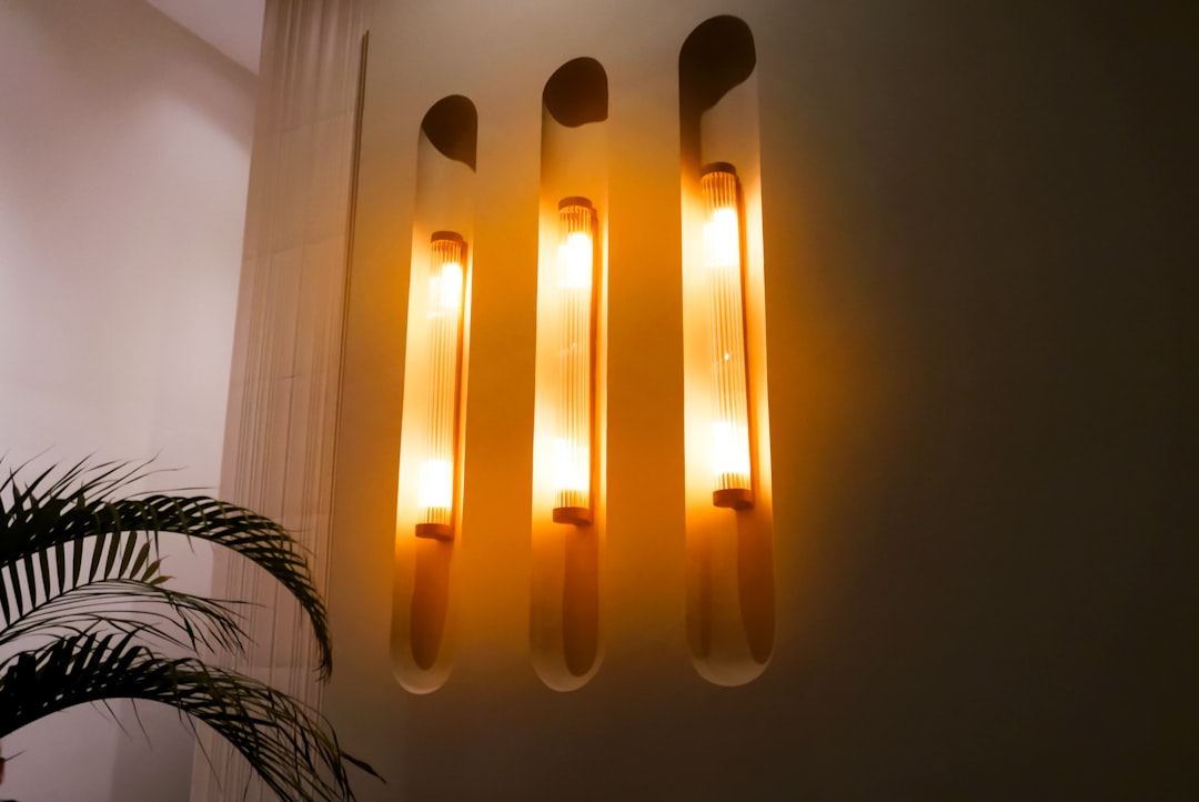 Timeless Elegance: Aged Brass Wall Sconce for Mid Century Style